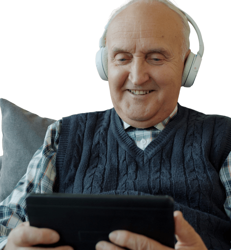 Meneer met koptelefoon op gebruikt tablet