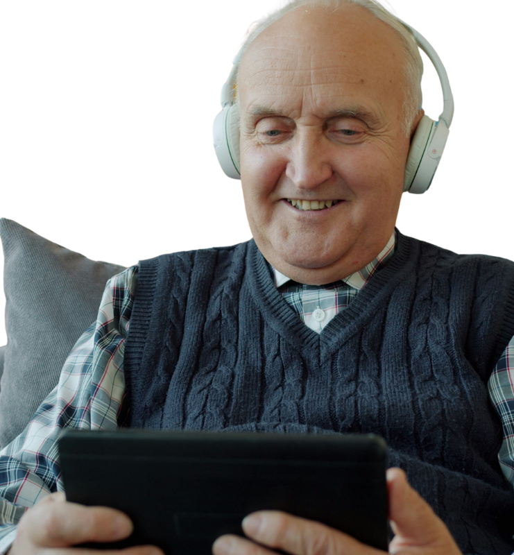 Meneer met koptelefoon op gebruikt tablet